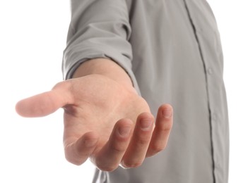 Man holding something in his hand on white background, closeup