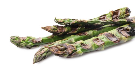 Photo of Tasty grilled green asparagus isolated on white