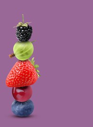 Stack of different fresh tasty berries and cherry on pale purple background, space for text