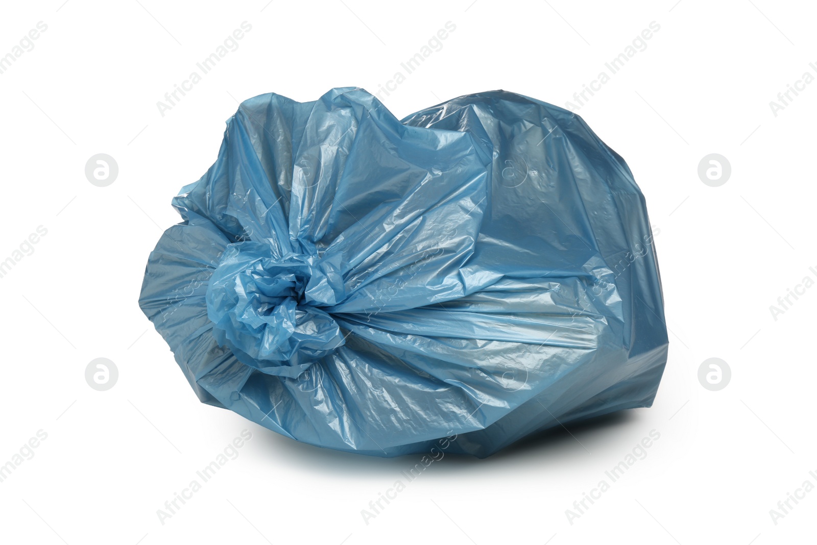 Photo of Blue trash bag filled with garbage isolated on white
