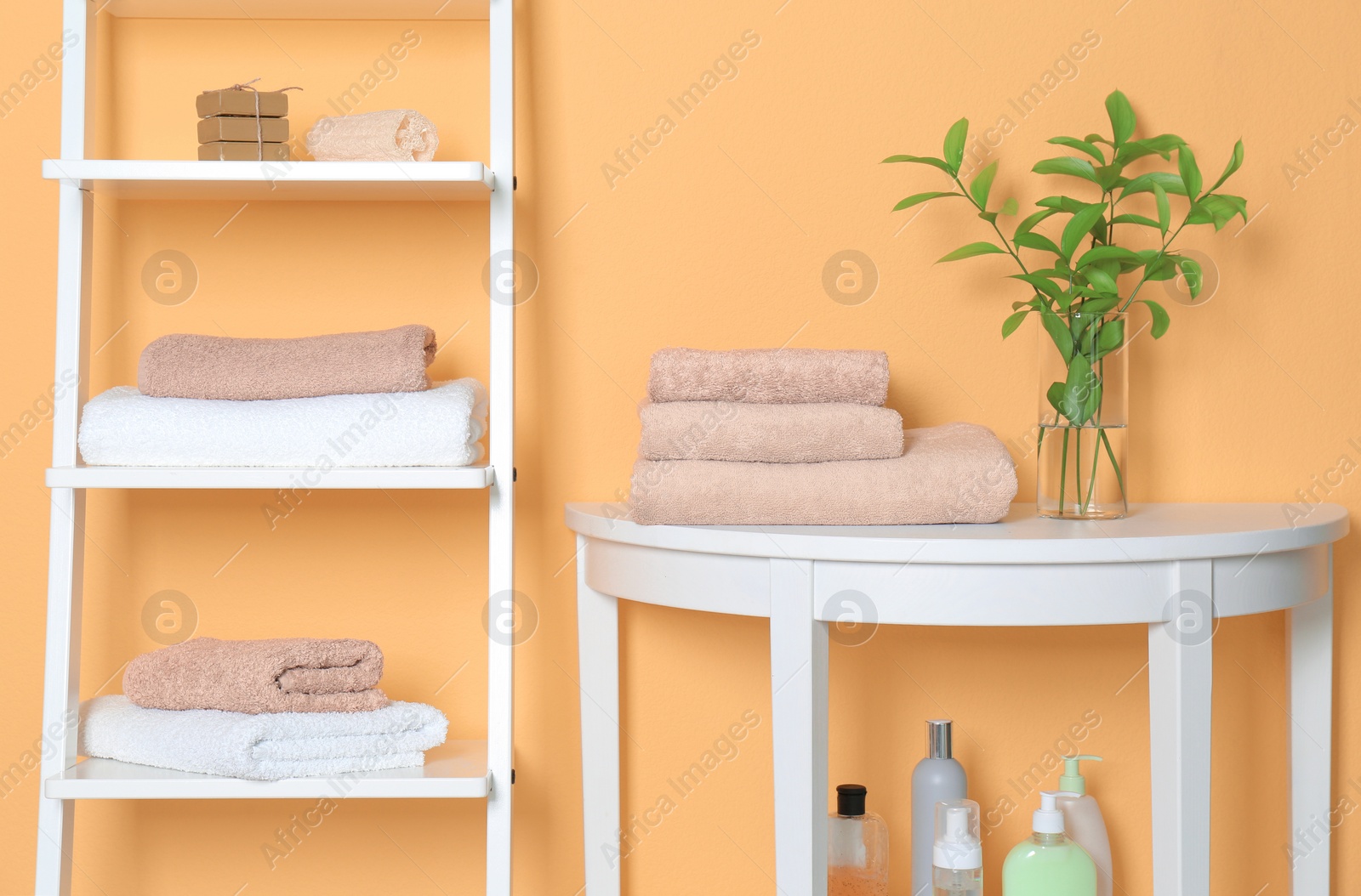 Photo of Clean towels in bathroom