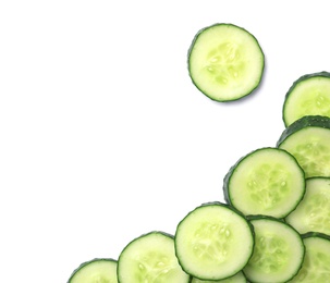 Photo of Slices of cucumbers on white background, top view