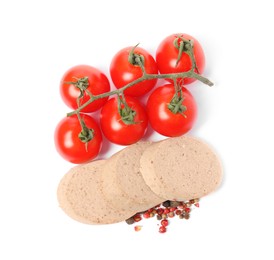 Photo of Slices of delicious liver sausage, tomatoes and peppercorns on white background, top view