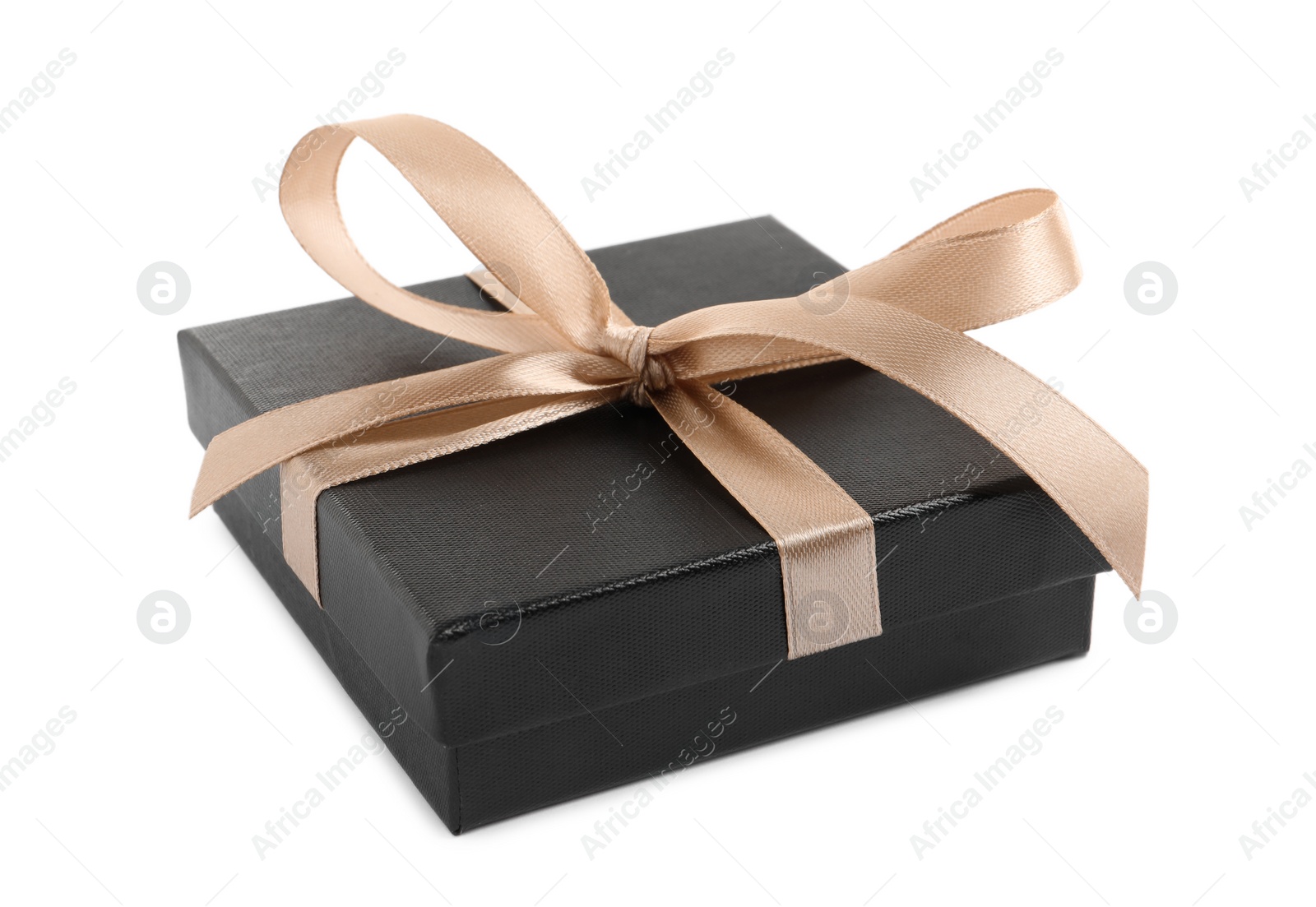 Photo of Dark gift box with golden bow on white background