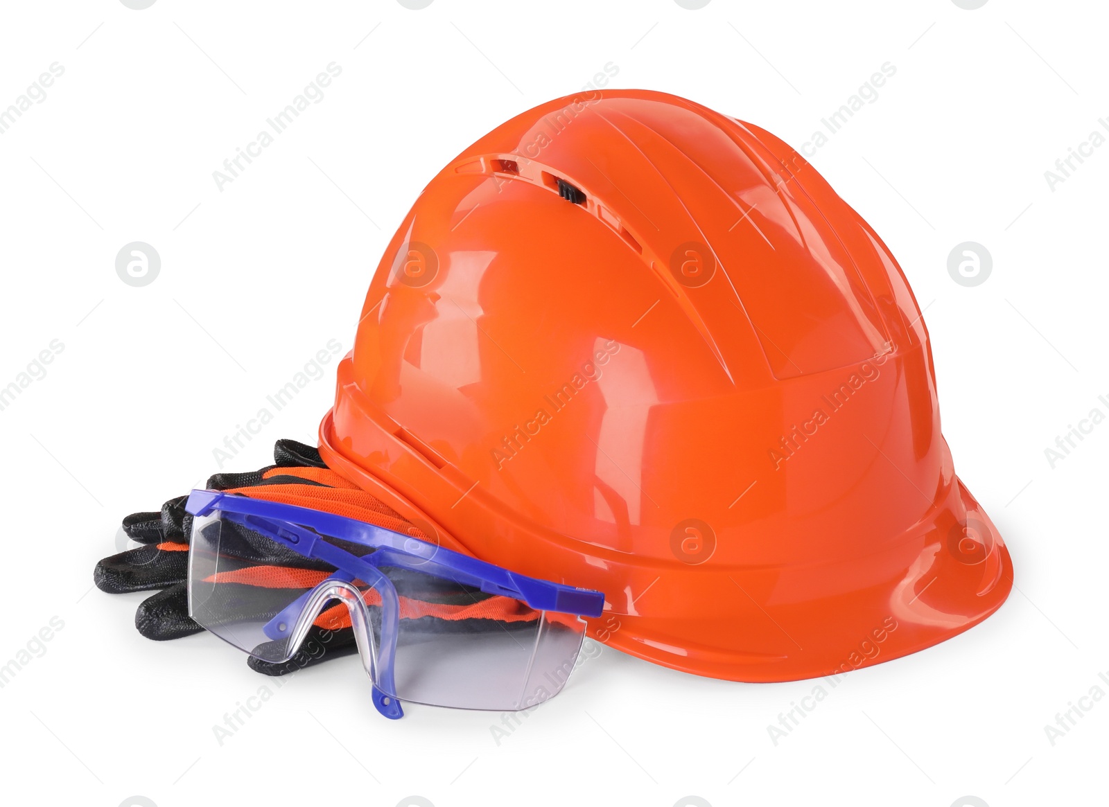 Photo of Hard hat, goggles and gloves isolated on white. Safety equipment