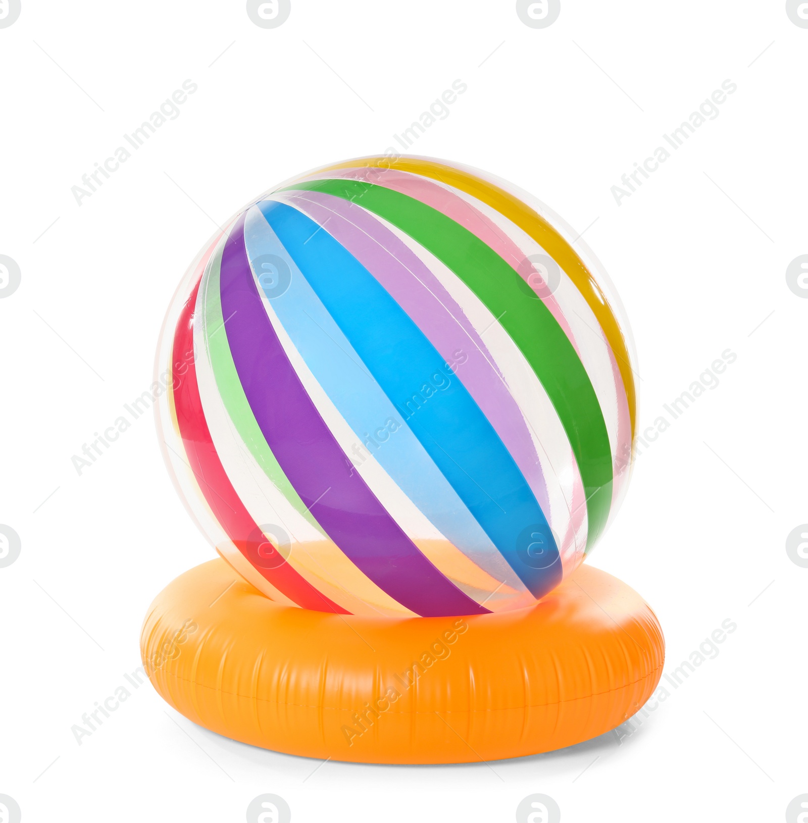 Photo of Bright inflatable ring and ball on white background. Summer holidays