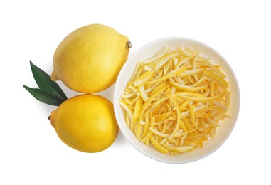 Photo of Bowl of lemon peel and fresh fruits on white background, top view. Citrus zest