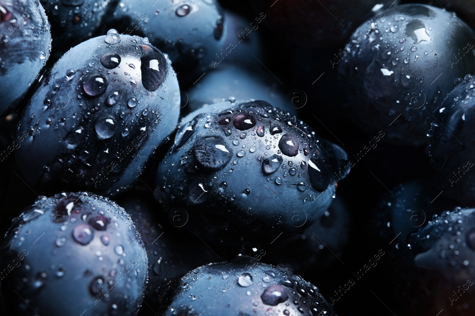 Photo of Bunch of fresh ripe juicy grapes as background. Closeup view