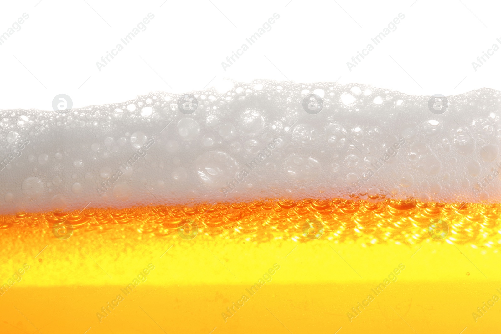 Photo of Tasty beer with foam in glass, closeup