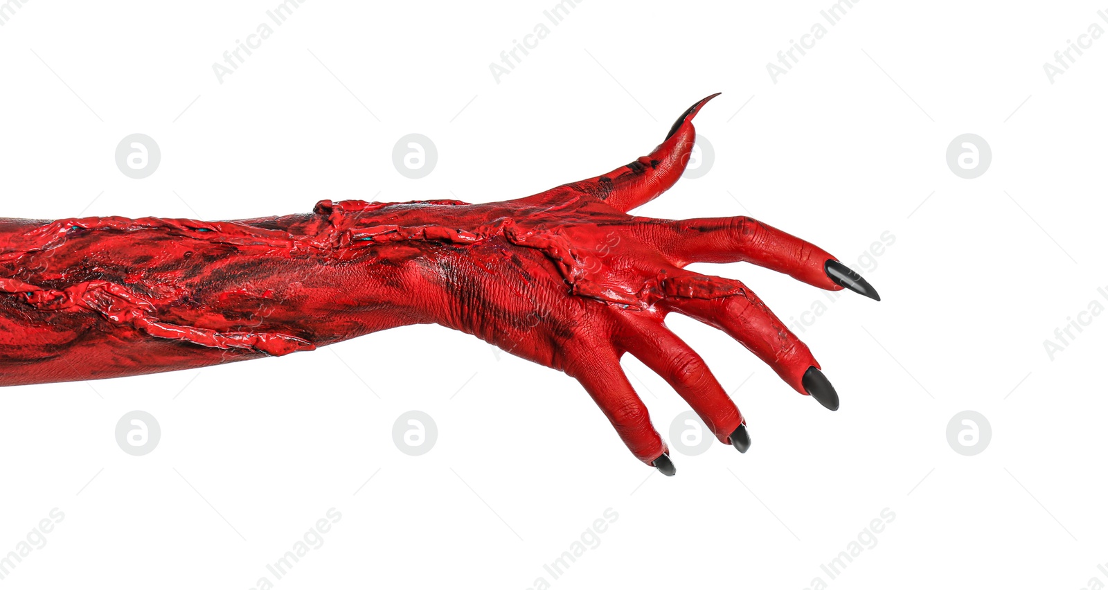 Photo of Scary monster on white background, closeup of hand. Halloween character