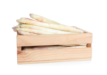 Photo of Fresh ripe asparagus in wooden crate isolated on white