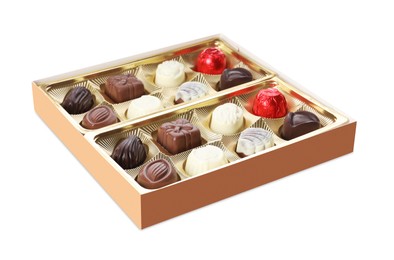 Photo of Box of delicious chocolate candies isolated on white