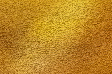 Image of Golden textured surface as background, closeup view