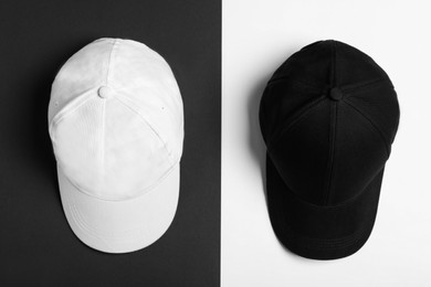 Photo of Baseball caps on color background, flat lay Mock up for design