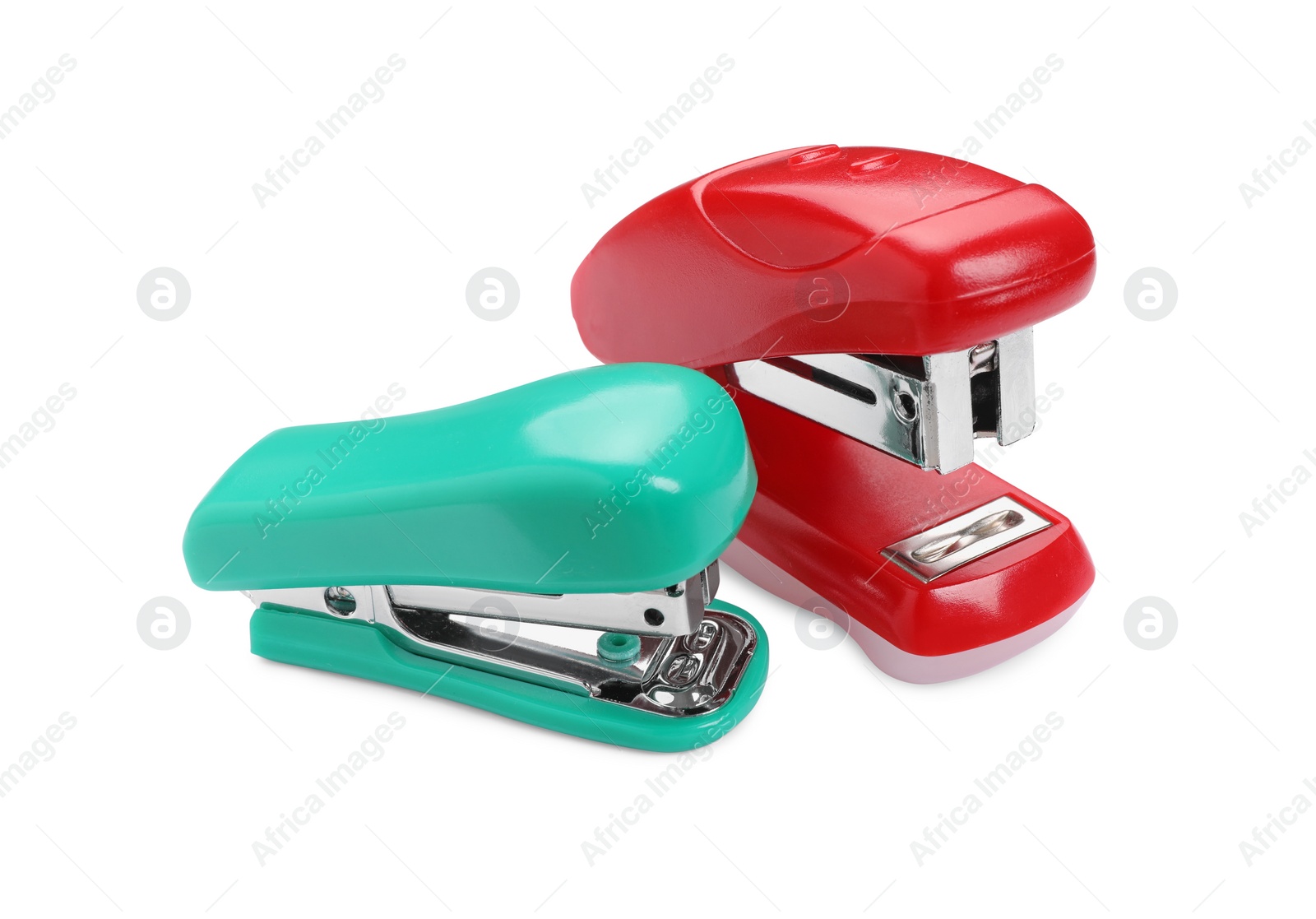 Photo of Two new bright staplers isolated on white