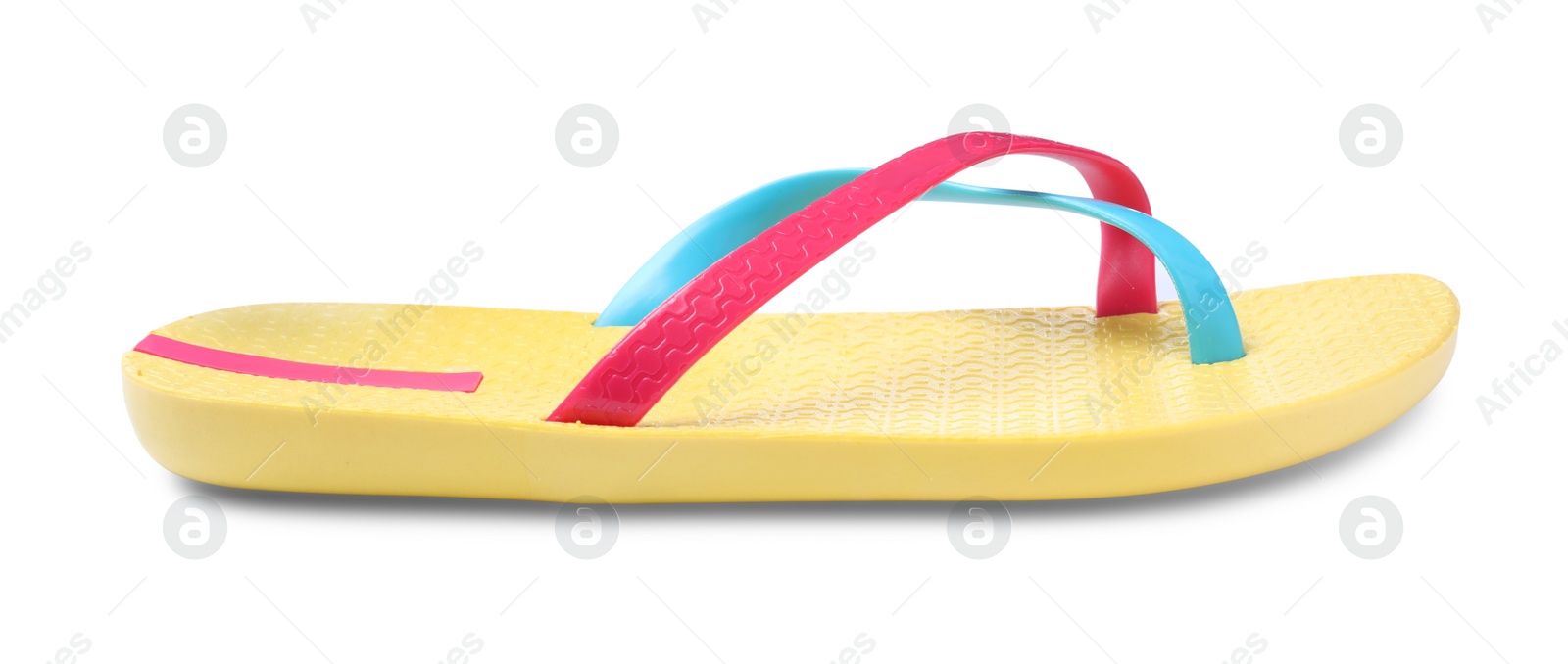 Photo of Single yellow flip flop isolated on white