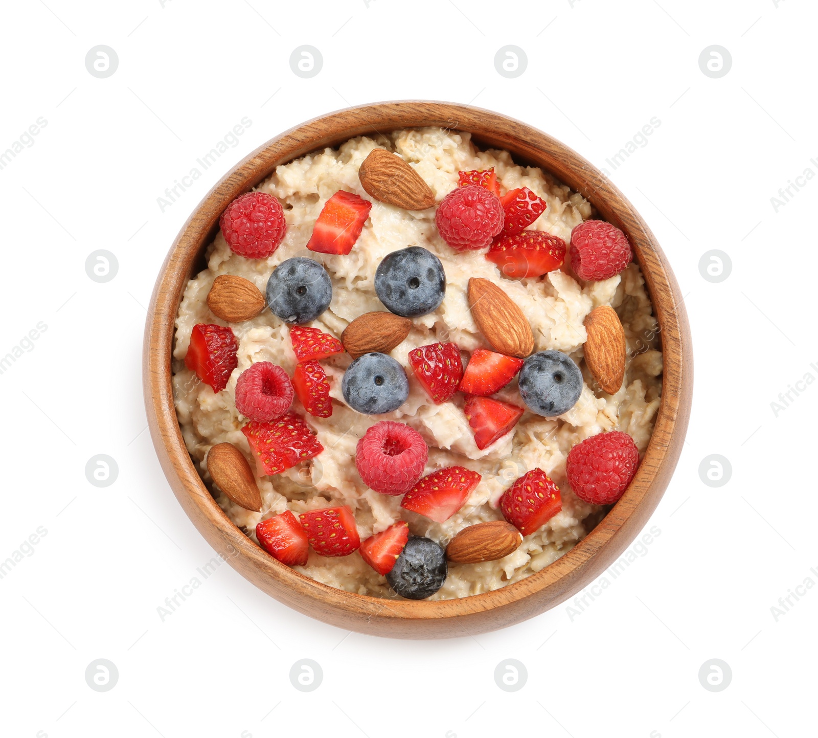 Photo of Tasty oatmeal porridge with berries and almond nuts in bowl on white background, top view