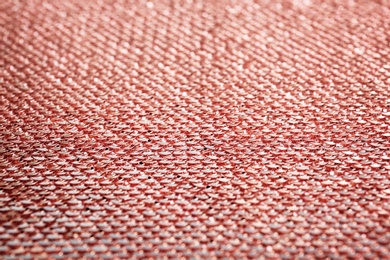 Photo of Rose paillettes on fabric as background, closeup