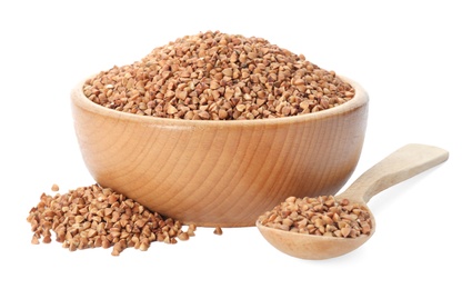 Raw buckwheat grains on white background. Healthy cereals