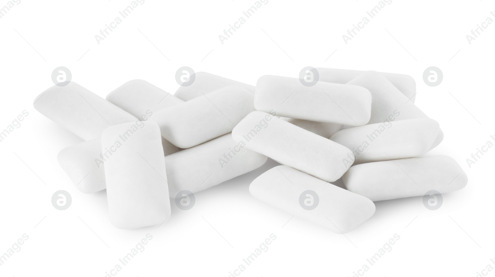 Photo of Pile of tasty chewing gums on white background