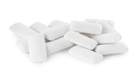 Photo of Pile of tasty chewing gums on white background