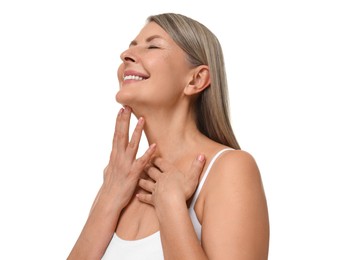 Photo of Beautiful woman touching her neck on white background
