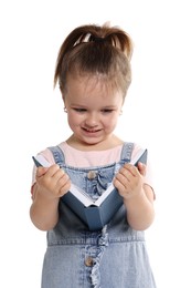 Photo of Cute little girl reading book on white background