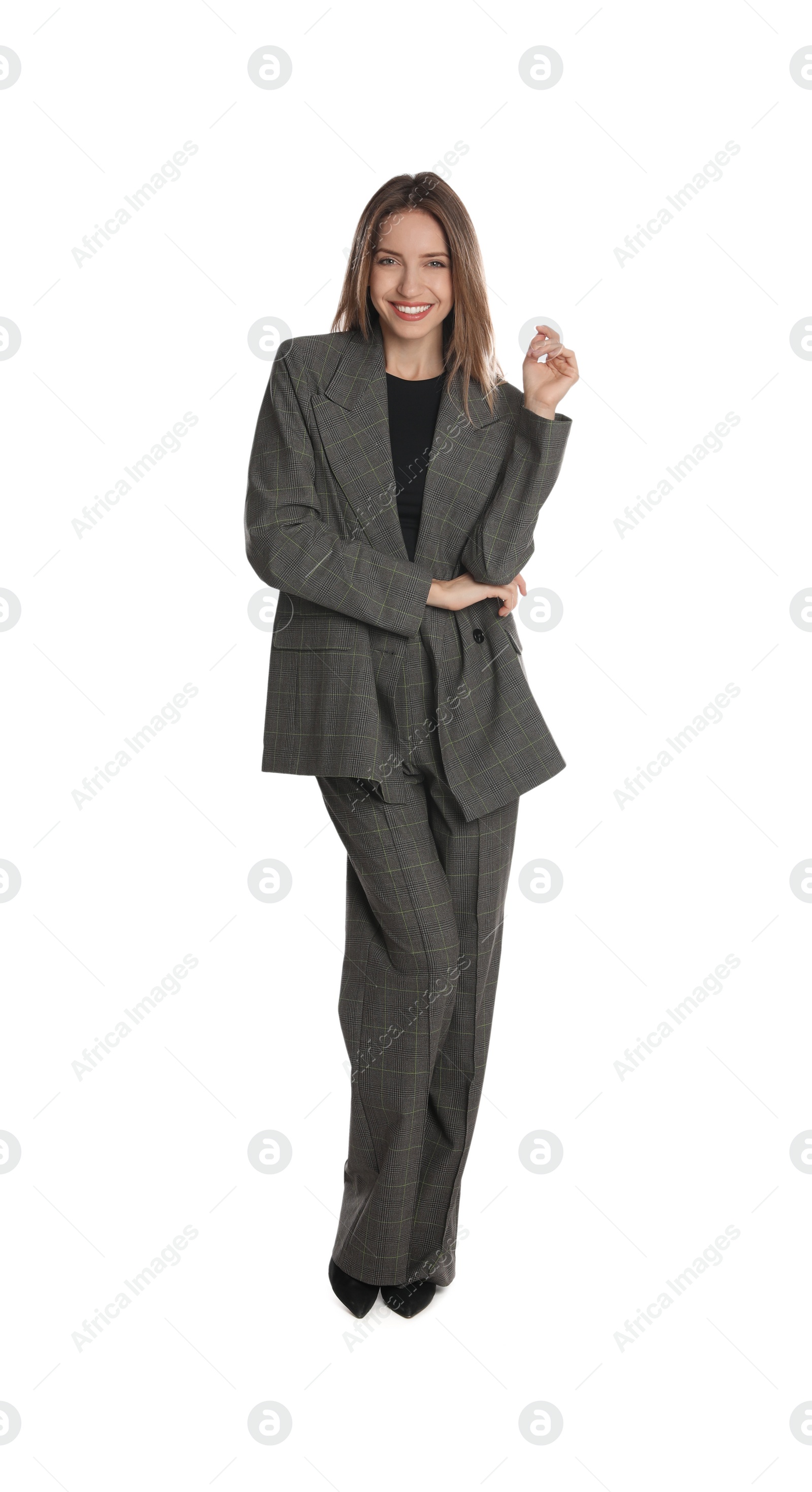 Photo of Full length portrait of beautiful young woman in fashionable suit on white background. Business attire