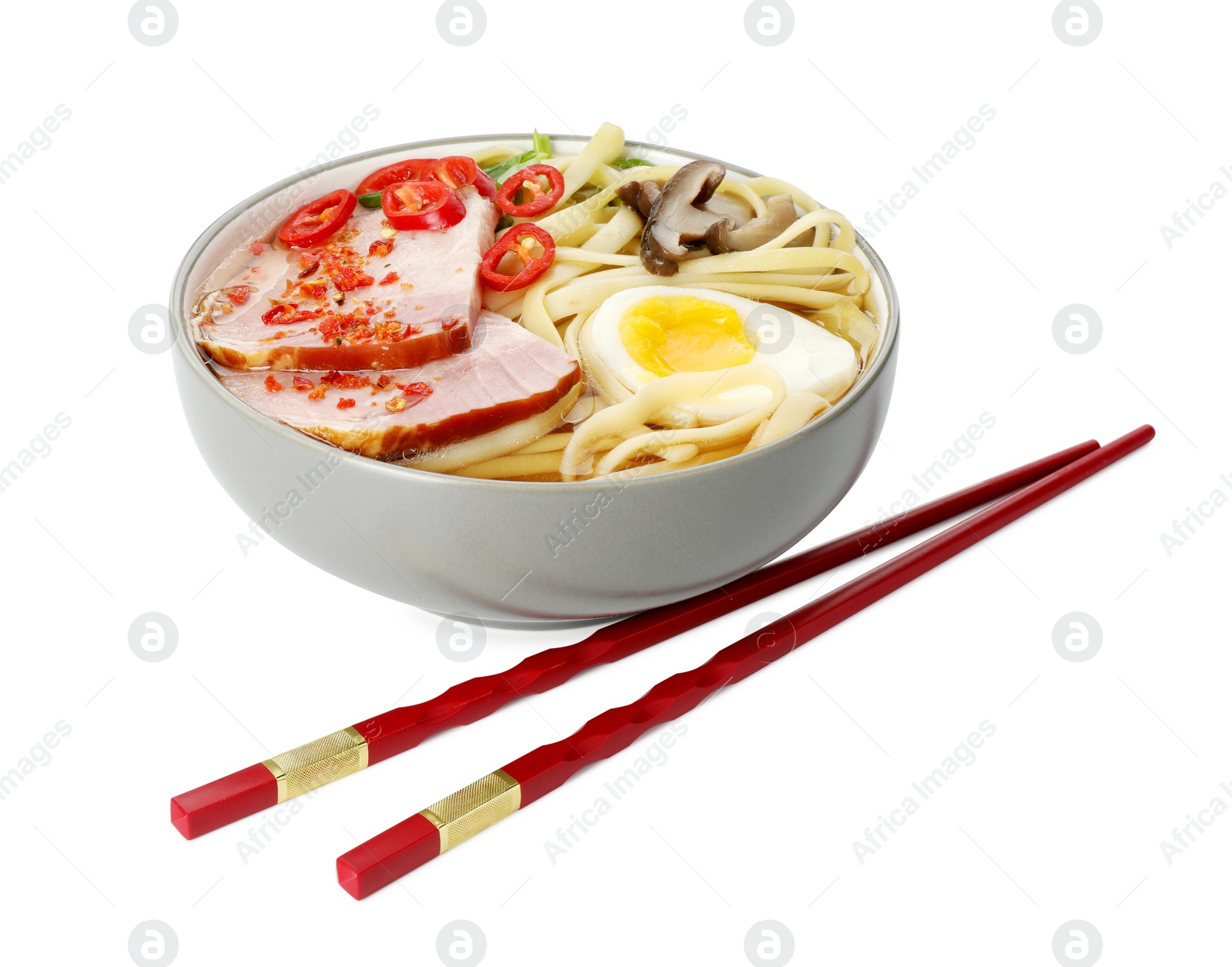 Photo of Delicious ramen in bowl and chopsticks isolated on white. Noodle soup