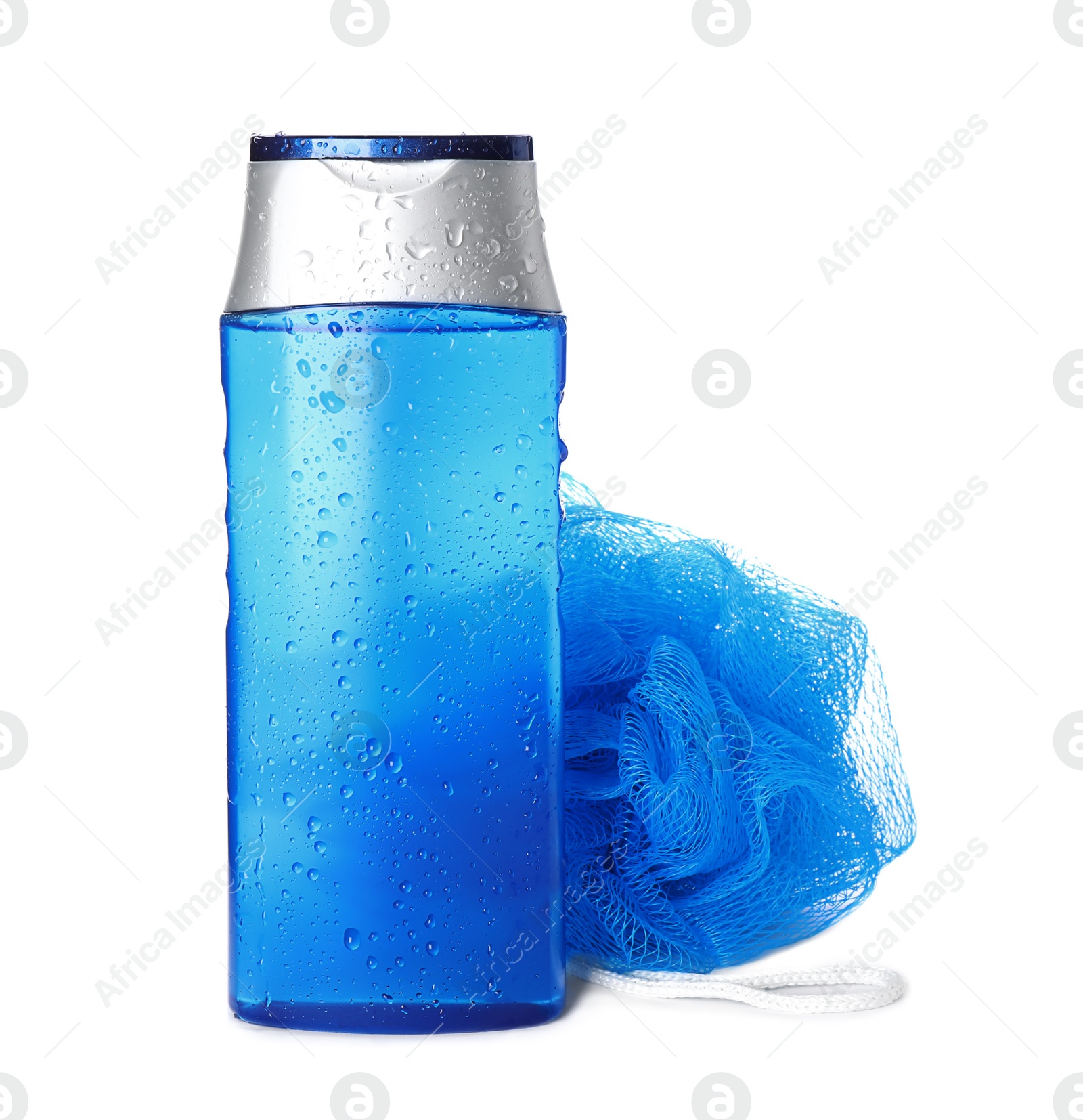 Photo of Bottle covered with water drops and bast wisp isolated on white. Men's cosmetics