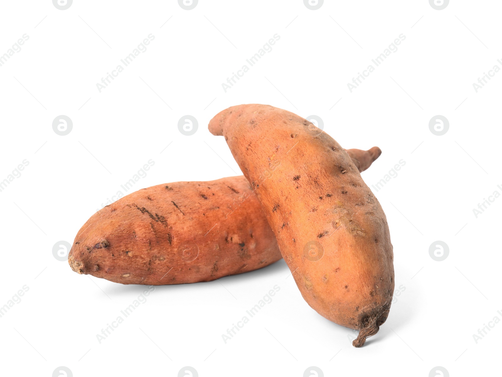 Photo of Whole ripe sweet potatoes on white background