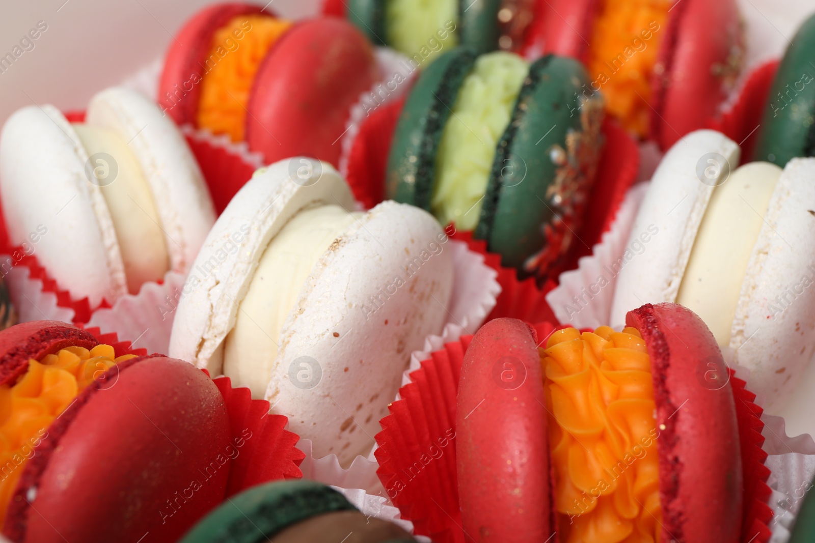 Photo of Many different tasty Christmas macarons, closeup view