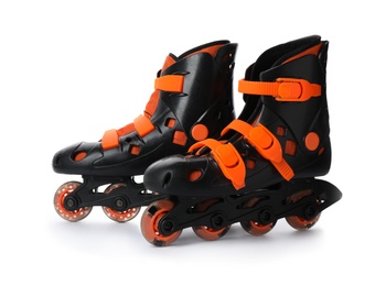 Photo of Pair of inline roller skates on white background