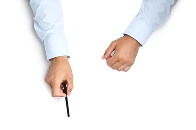 Photo of Man with pen on white background, top view. Closeup of hands
