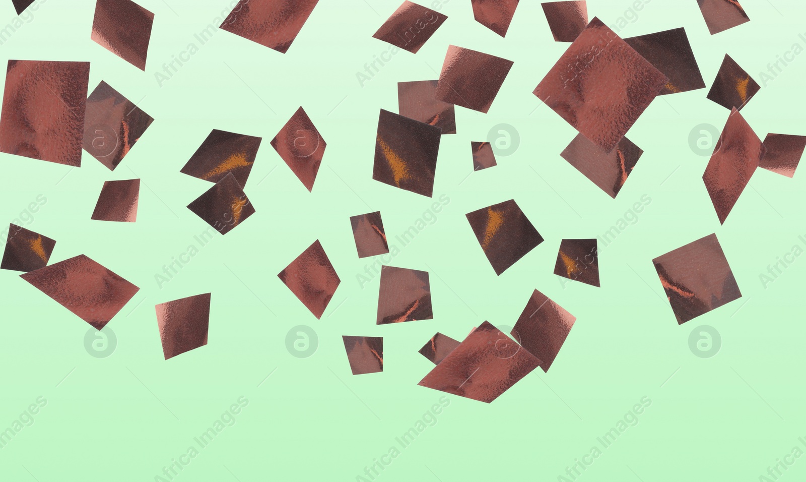 Image of Shiny bronze confetti falling on light green background. Banner design