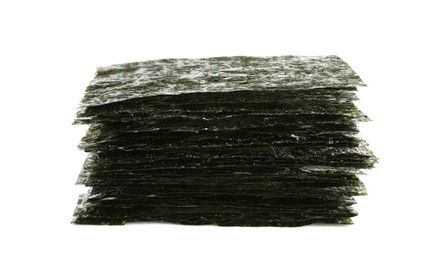 Stack of dry nori sheets on white background
