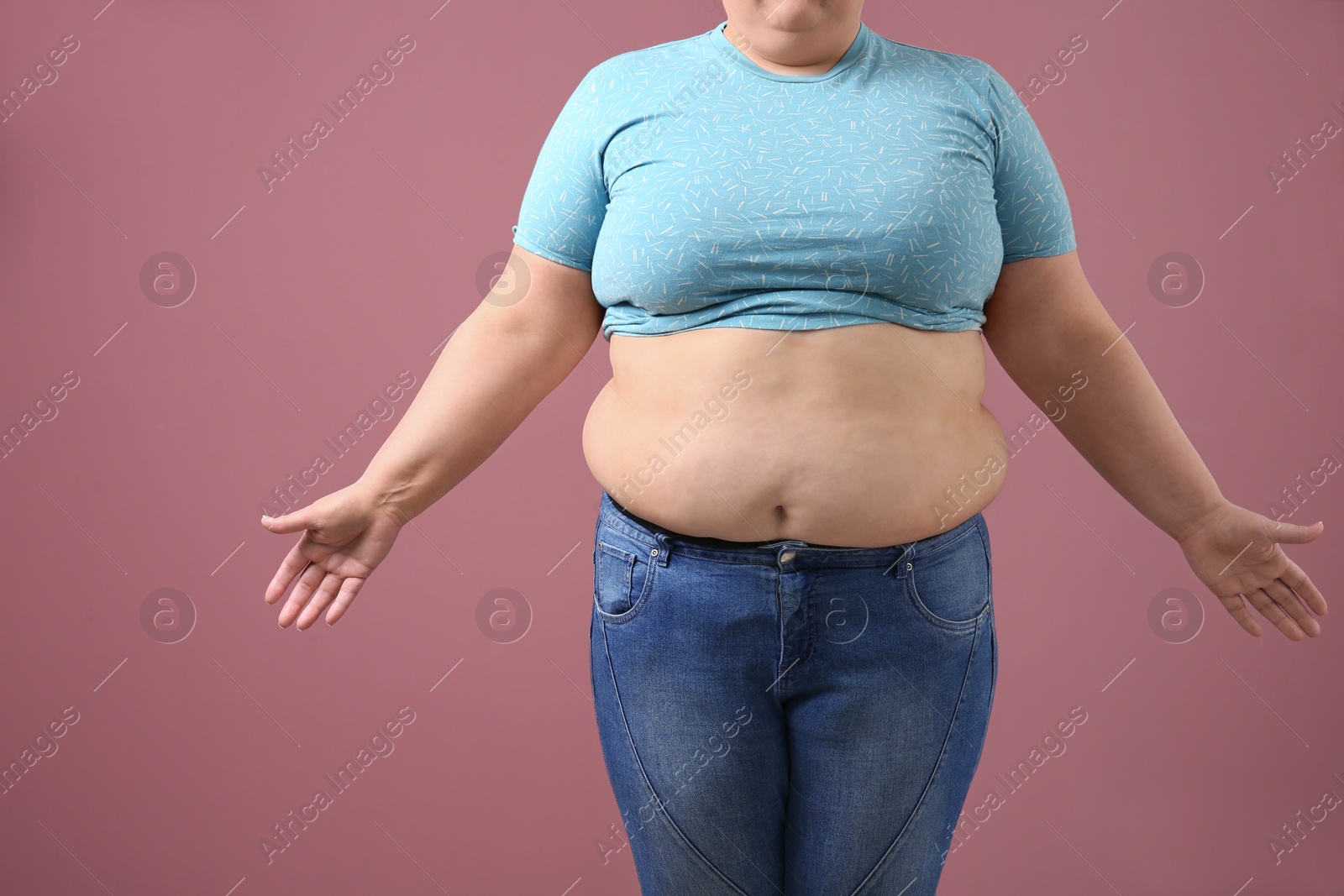 Photo of Overweight woman on color background