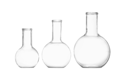 Photo of Empty Florence flasks on white background. Chemistry glassware