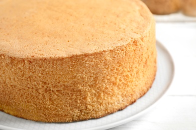 Photo of Delicious fresh homemade cake on white table, closeup