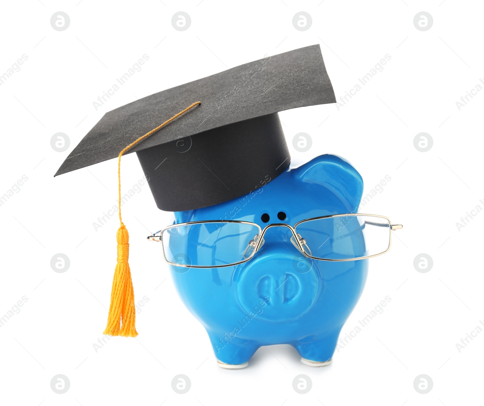 Photo of Piggy bank with glasses in graduation hat isolated on white