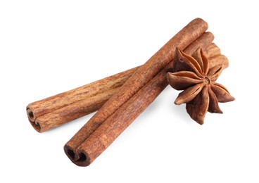 Photo of Cinnamon sticks and anise star isolated on white