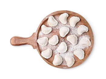 Photo of Raw dumplings (varenyky) with tasty filling and flour on white background, top view