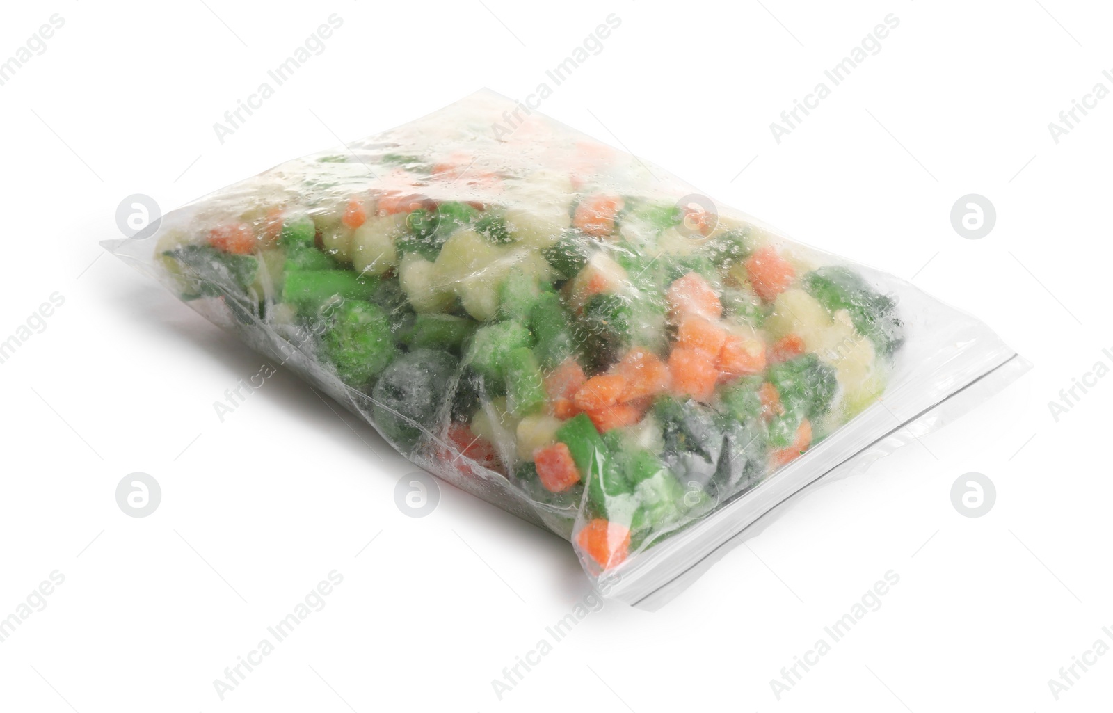 Photo of Frozen vegetables in plastic bag isolated on white
