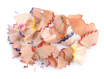 Photo of Pile of colorful pencil shavings on white background, top view