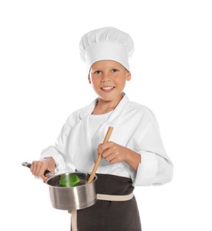 Portrait of little boy in chef hat with saucepan on white background