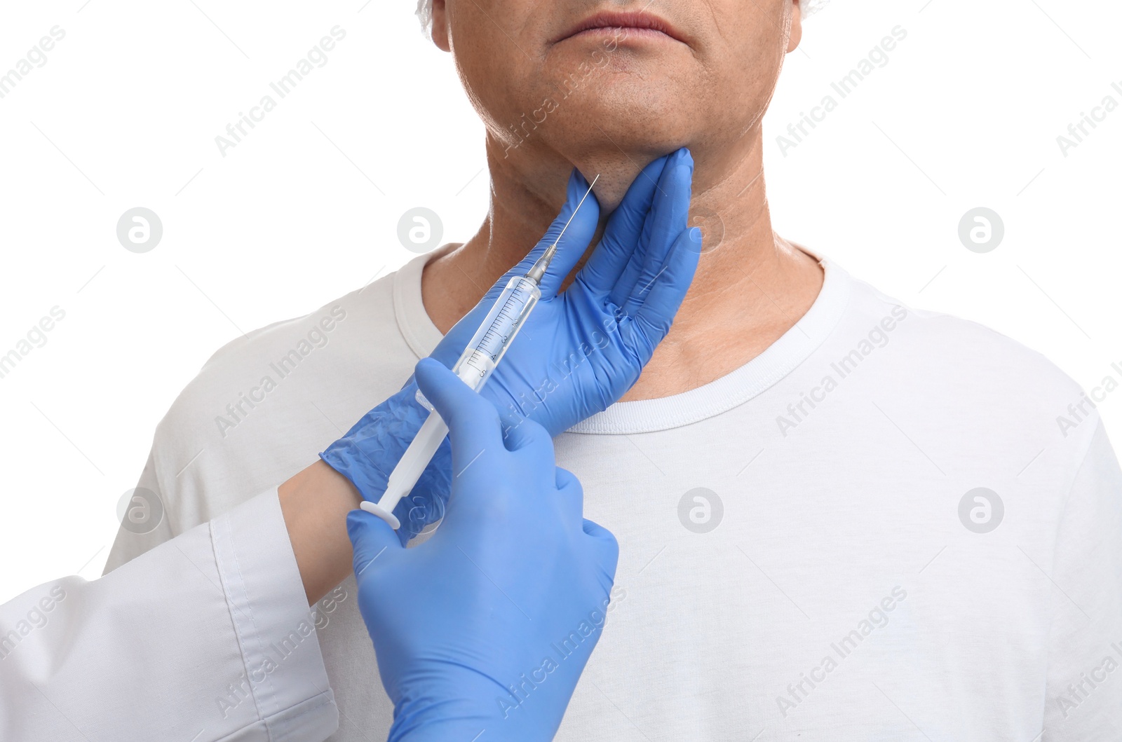 Photo of Mature man with double chin receiving injection on white background, closeup