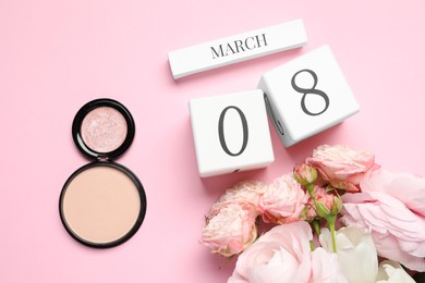 Photo of International Women's day - 8th of March. Cosmetic products, wooden block calendar and beautiful flowers on pink background, flat lay