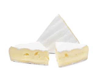 Photo of Tasty cut brie cheese on white background