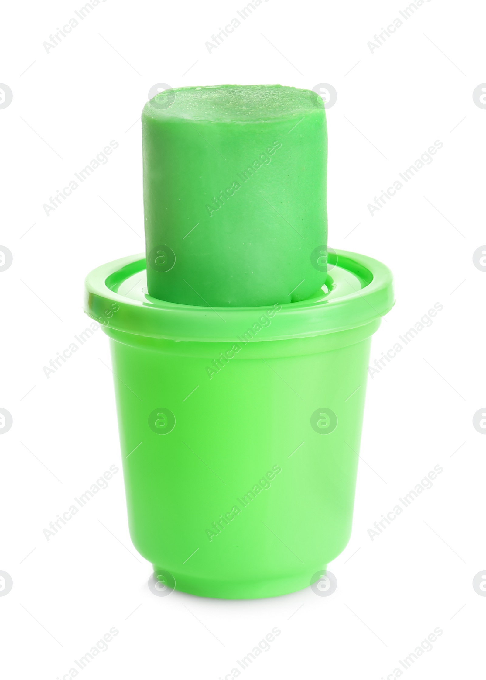 Photo of Colorful play dough and container on white background