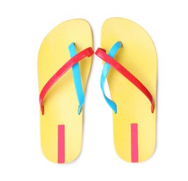 Photo of Pair of yellow flip flops isolated on white, top view